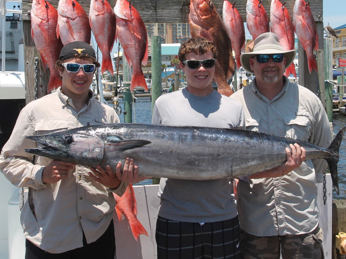 JP12 father and sons with big fish