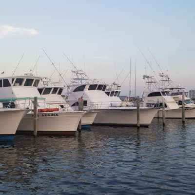 a boat is docked next to a body of water