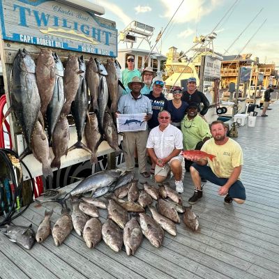 a group of people standing outside of a building